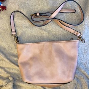 Pink handbag with adjustable strap
